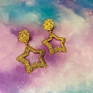 Gold textured open star statement drop earrings